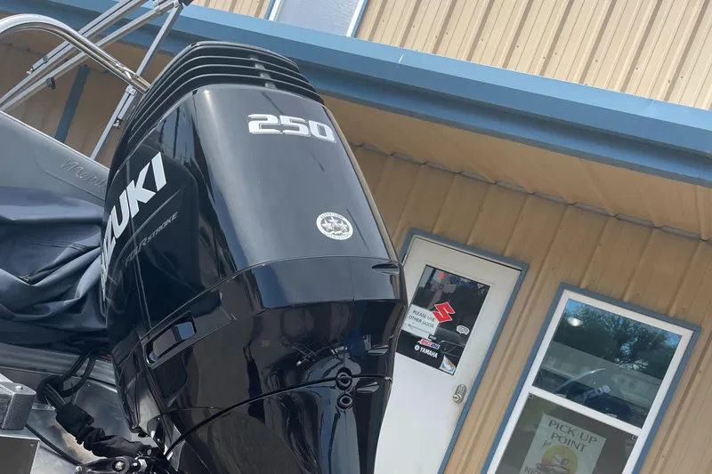 Slide: The Image of 2022 Manitou Oasis 23 SL SHP373 with Suzuki 250 outboard motor. - 9