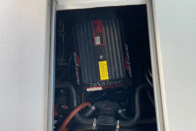 Slide: The Image of 1993 Chaparral 280 SIGNATURE engine compartment with MerCruiser 7.4L V8 Bravo engine. - 2