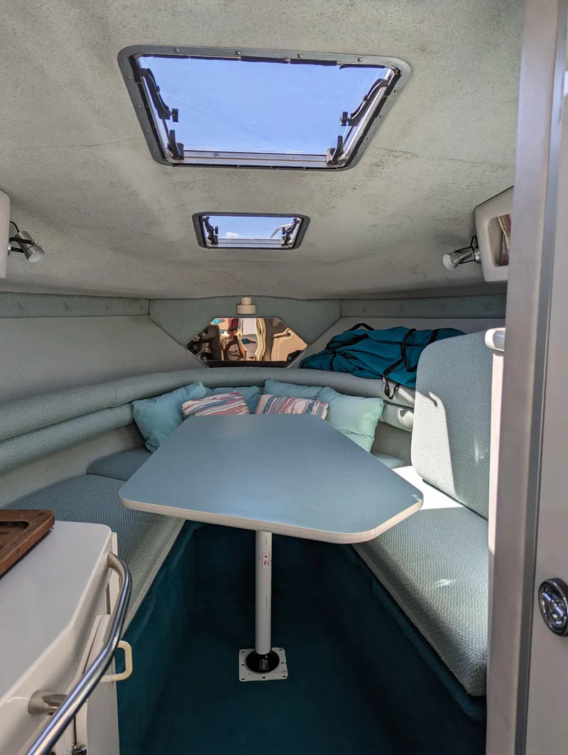 Slide: The Image of Interior cabin of 1993 Chaparral 280 SIGNATURE boat with skylights and seating area. - 8