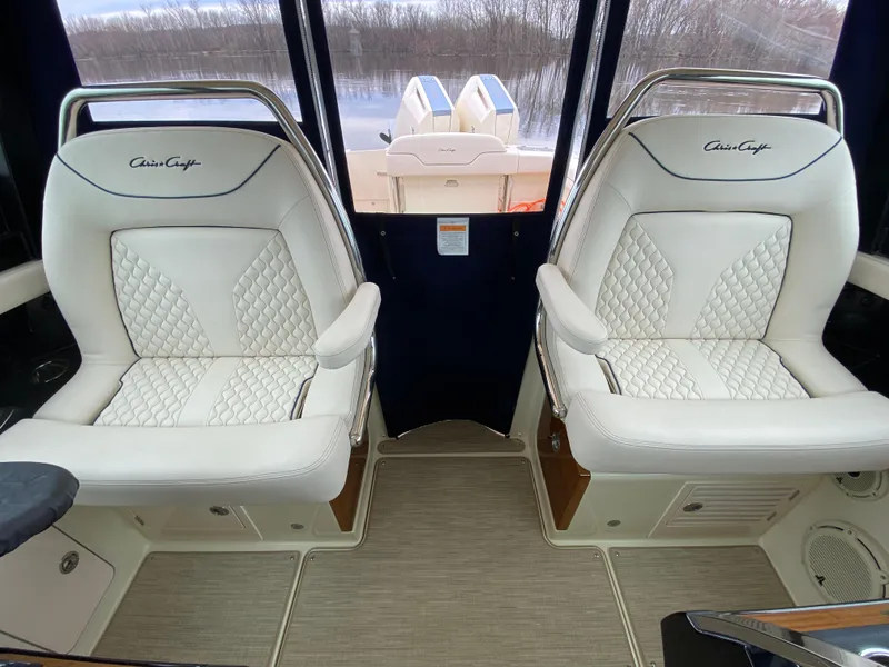 Slide: The Image of Storage compartment on a 2024 Chris-Craft Calypso 32 boat. - 11