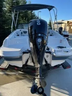 Slide: The Image of 2024 Tahoe 185 S boat with outboard motor, rear view. - 4