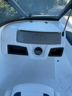 Slide: The Image of 2024 Tahoe 185 S boat dashboard with steering wheel and instrument panel. - 6