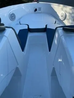 Slide: The Image of 2024 Tahoe 185 S boat interior with seating and speakers. - 8