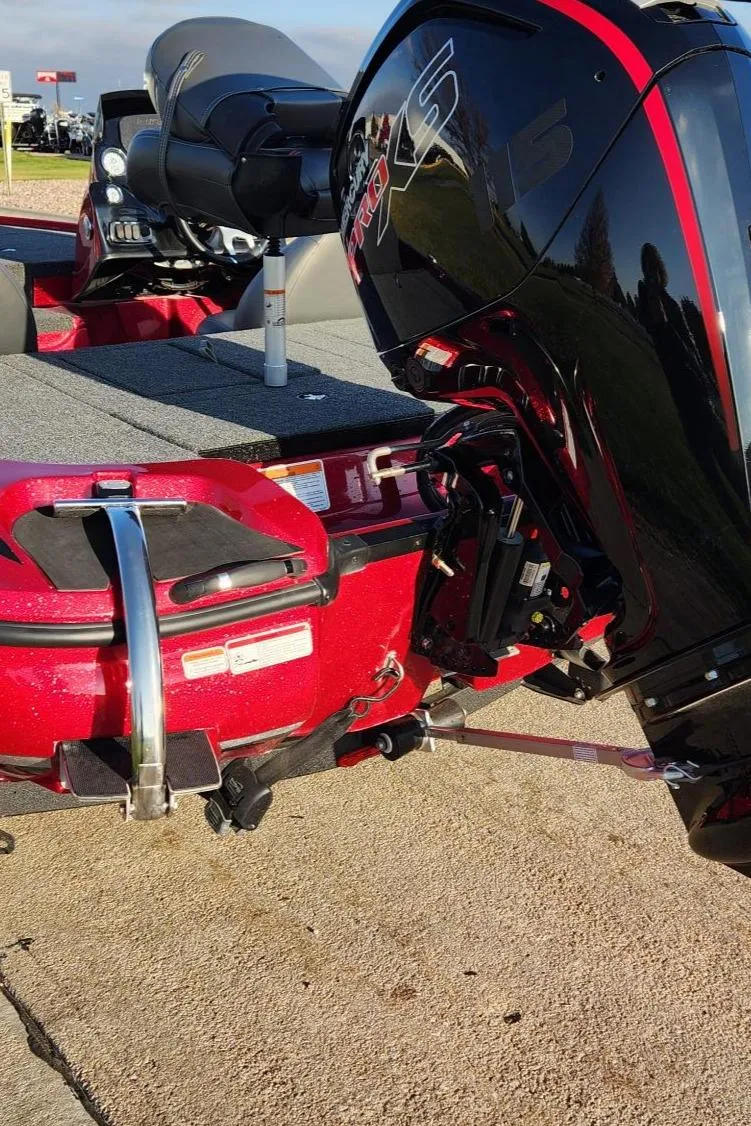 Slide: The Image of 2024 Nitro Z17 boat with powerful outboard motor on trailer. - 2