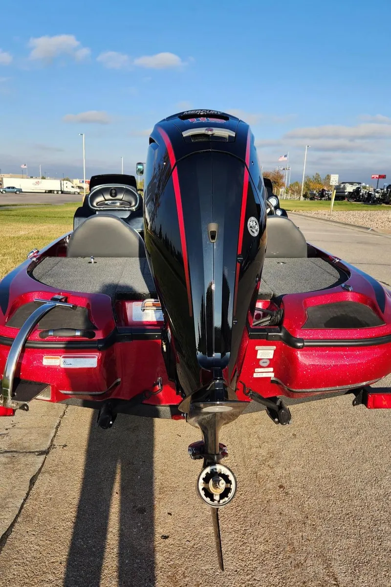 Slide: The Image of 2024 Nitro Z17 bass boat with powerful outboard motor. - 3