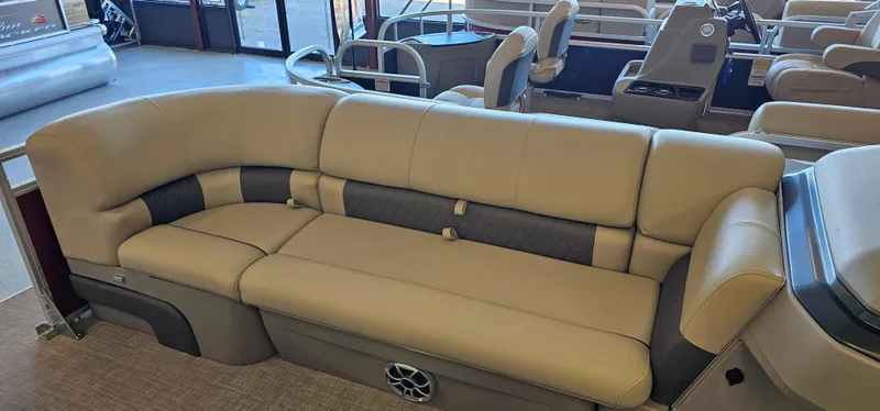 Slide: The Image of 2024 Sun Tracker Party Barge 20 DLX interior seating, beige upholstery, spacious and comfortable design. - 6