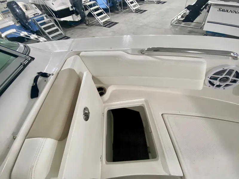 Slide: The Image of 2024 Robalo R207 Dual Console boat interior storage compartment. - 26