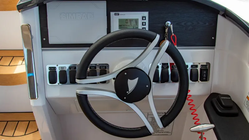 Slide: The Image of Steering wheel and control panel of 2023 Alfastreet 23 Cabin Electric boat. - 13