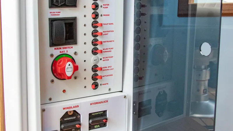 Slide: The Image of Control panel of 2023 Alfastreet 23 Cabin Electric boat with switches and indicators. - 23