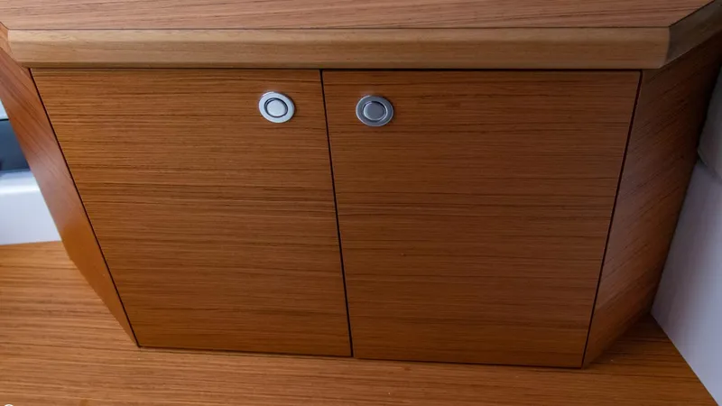 Slide: The Image of Wooden cabinet in the 2023 Alfastreet 23 Cabin Electric boat interior. - 24