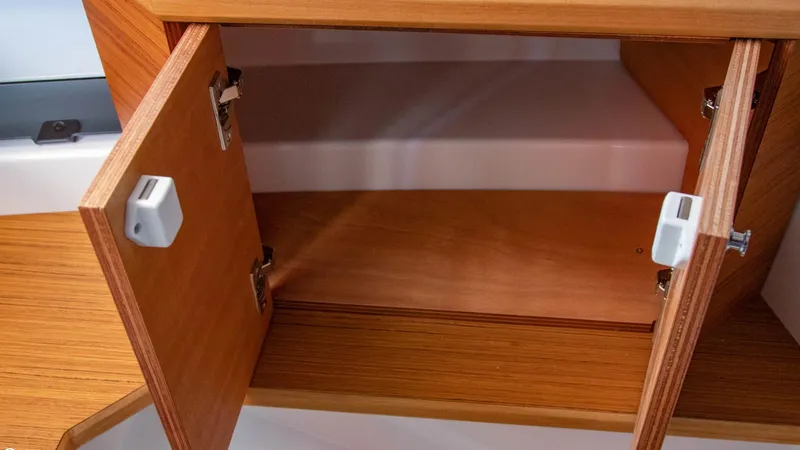 Slide: The Image of Open wooden cabinet in 2023 Alfastreet 23 Cabin Electric boat. - 25