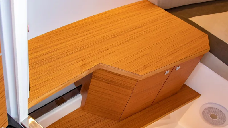 Slide: The Image of Interior of 2023 Alfastreet 23 Cabin Electric boat with wooden cabinetry. - 27