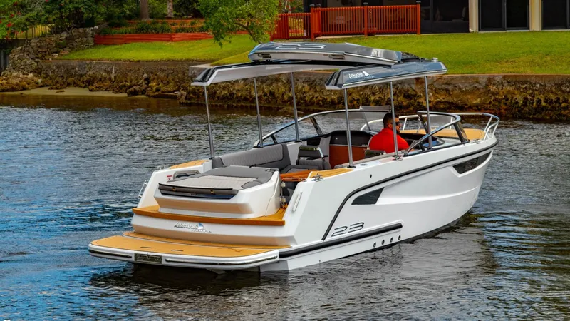 Slide: The Image of 2023 Alfastreet 23 Cabin Electric boat cruising on a calm river. - 3