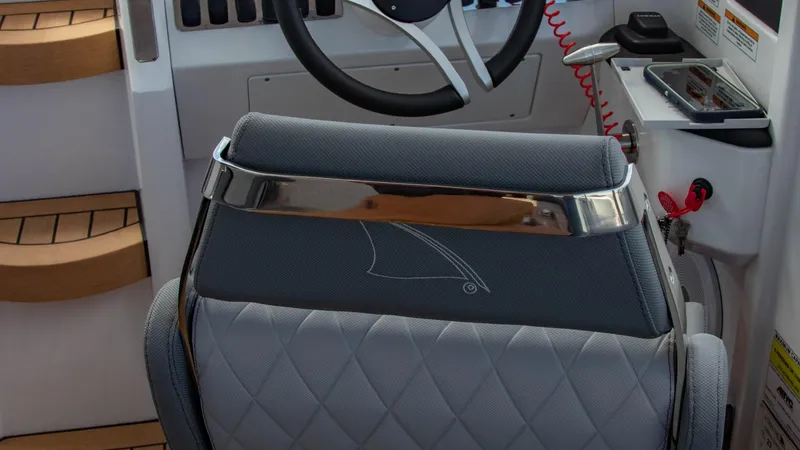 Slide: The Image of Captain's seat and helm of the 2023 Alfastreet 23 Cabin Electric boat. - 37