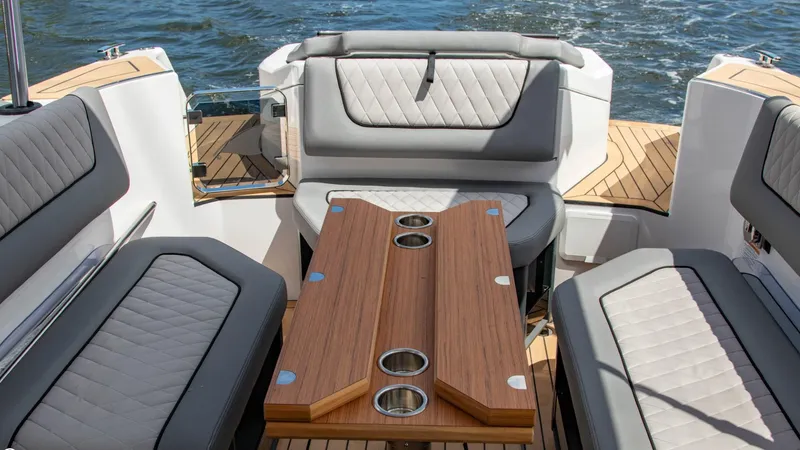 Slide: The Image of 2023 Alfastreet 23 Cabin Electric boat interior with seating and table. - 45
