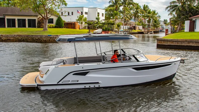 Slide: The Image of 2023 Alfastreet 23 Cabin Electric boat cruising in a scenic canal. - 9