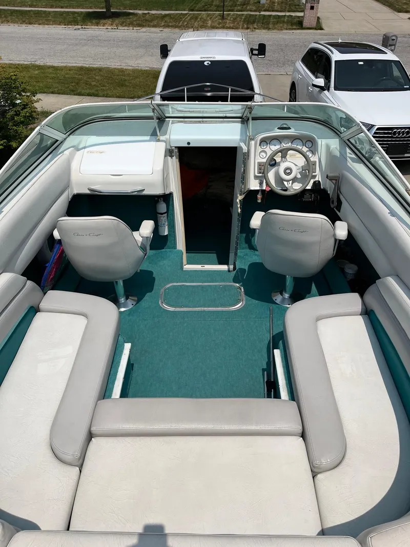 Slide: The Image of 1993 Chris-Craft 238 Concept boat interior with seating and steering console. - 18