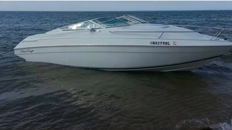 Slide: The Image of 1993 Chris-Craft 238 Concept boat on water. - 4