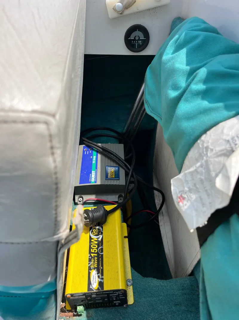 Slide: The Image of Battery and inverter setup in a 1993 Chris-Craft 238 Concept boat. - 7