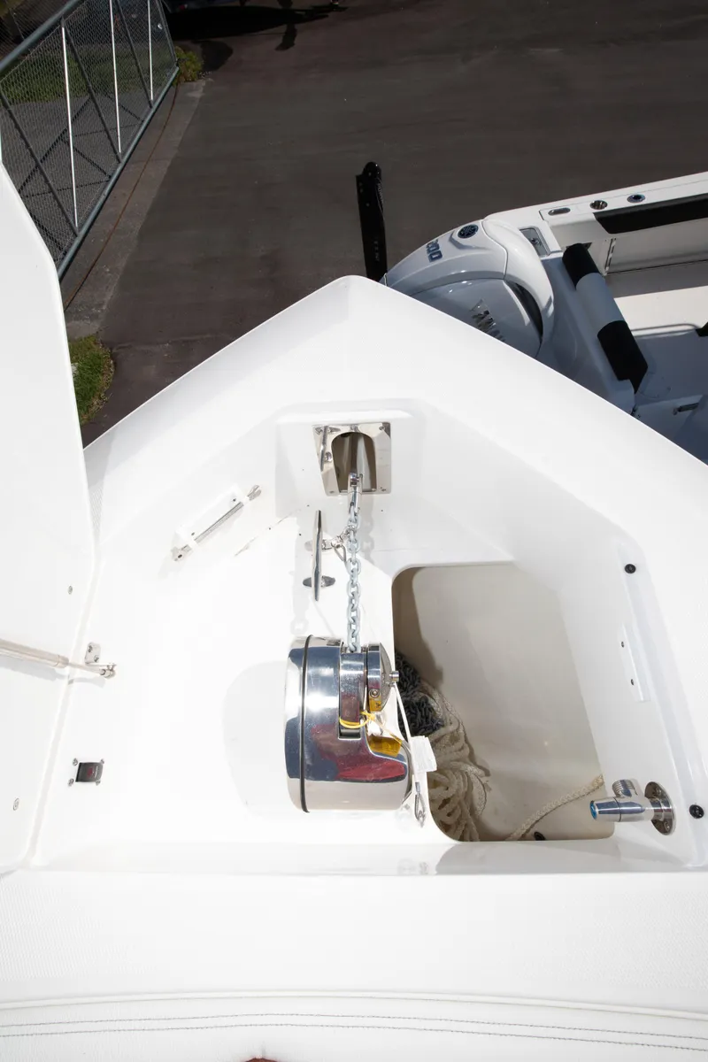 Slide: The Image of 2024 Edgewater 340CC anchor locker and bow storage. - 18