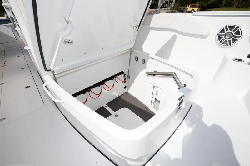 Slide: The Image of 2024 Edgewater 340CC boat storage compartment with open hatch. - 9