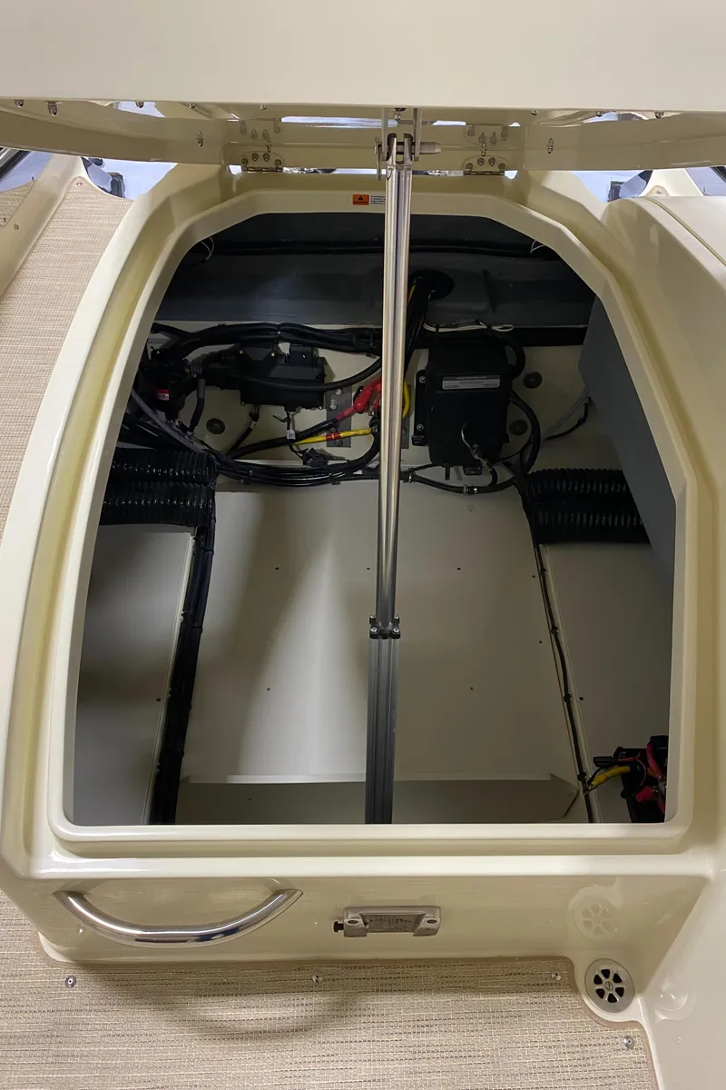 Slide: The Image of 2025 Chris-Craft Launch 28 GT boat interior with sink and storage compartment. - 10