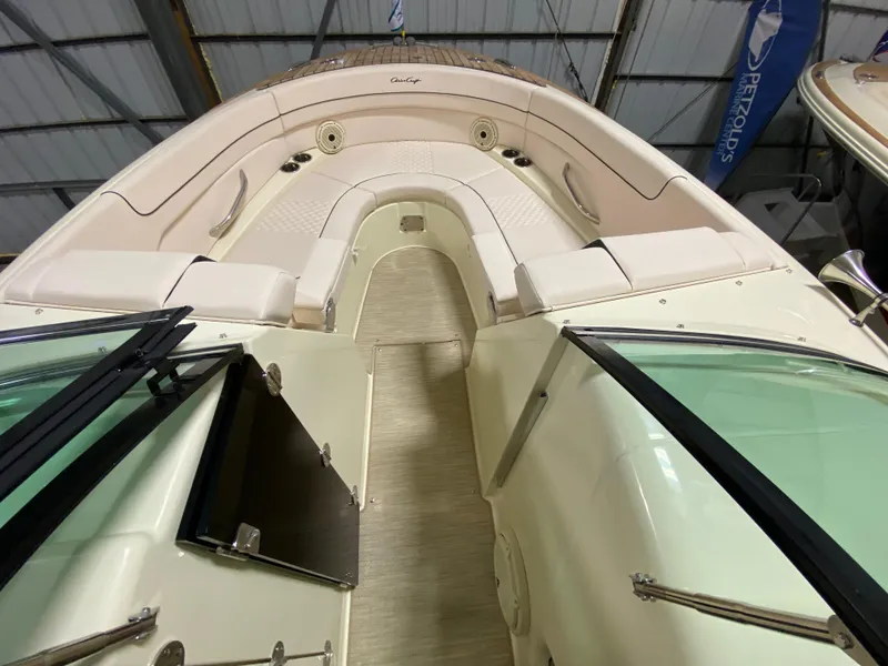 Slide: The Image of 2025 Chris-Craft Launch 28 GT interior with luxurious beige seating and elegant design. - 19