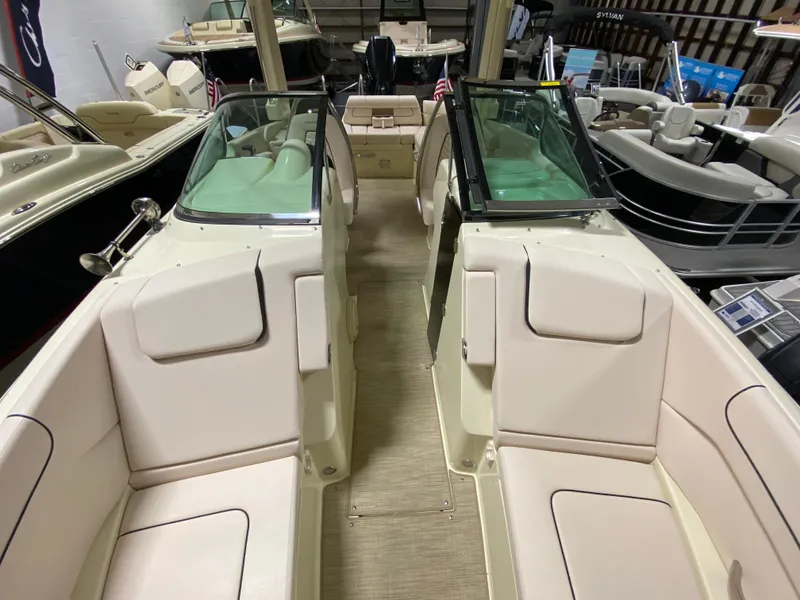 Slide: The Image of 2025 Chris-Craft Launch 28 GT interior with seating and storage compartments. - 21