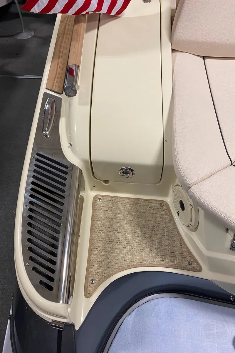 Slide: The Image of 2025 Chris-Craft Launch 28 GT anchor compartment with chain and mechanical components. - 23