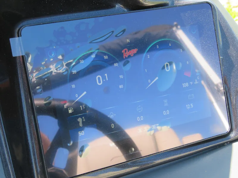 Slide: The Image of 2024 Ranger 223FC digital dashboard display showing speed, temperature, and other metrics. - 8