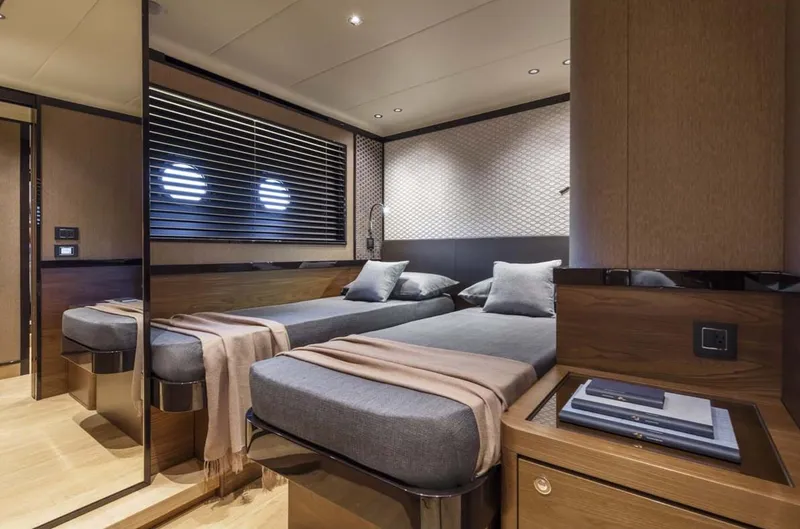 Slide: The Image of Luxurious twin bedroom on the 2024 Absolute 68 NAVETTA yacht. - 18