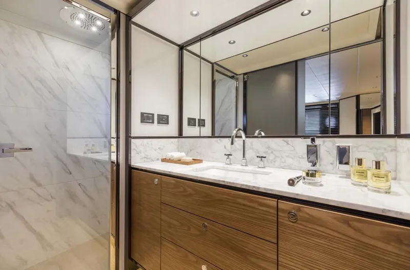 Slide: The Image of Luxurious bathroom in 2024 Absolute 68 NAVETTA yacht with marble and wood finishes. - 20