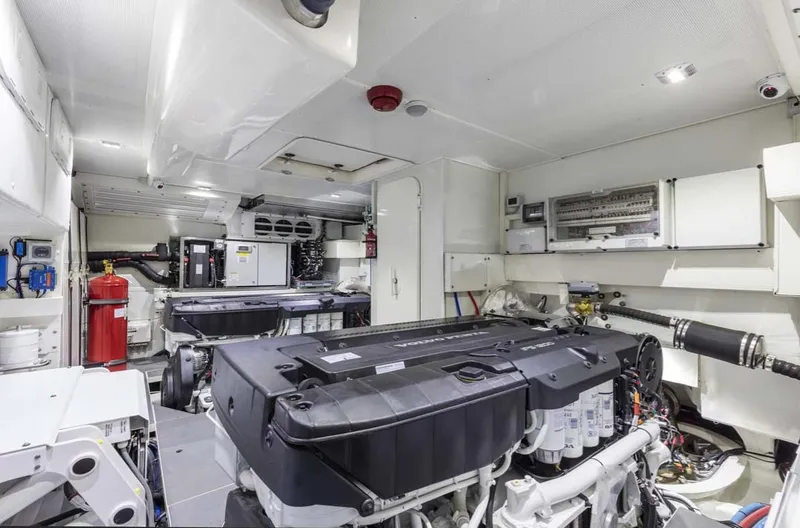 Slide: The Image of Engine room of a 2024 Absolute 68 NAVETTA yacht with modern equipment and clean layout. - 22