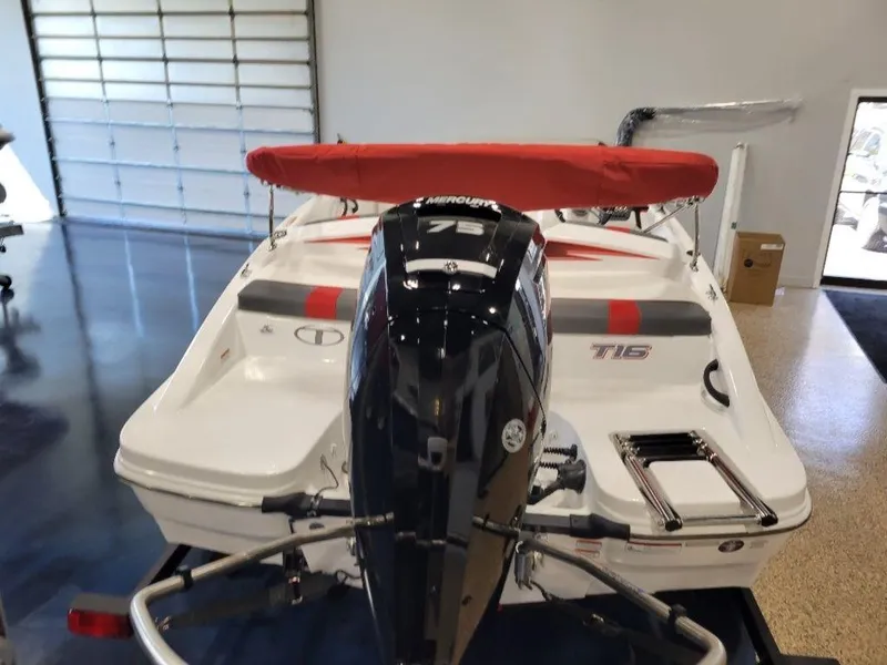 Slide: The Image of 2024 Tahoe T16 boat with Mercury outboard motor in showroom. - 3
