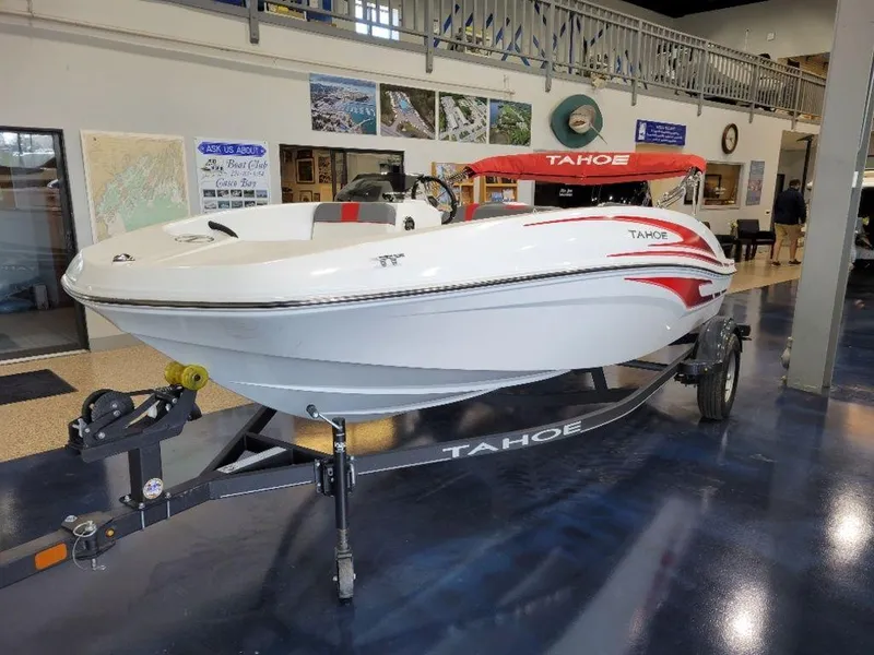 Slide: The Image of 2024 Tahoe T16 boat on display in showroom. - 4