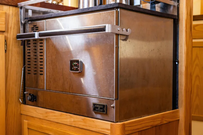 Slide: The Image of Stainless steel oven in 2009 Custom Gartside Downeast Cruiser kitchen. - 17
