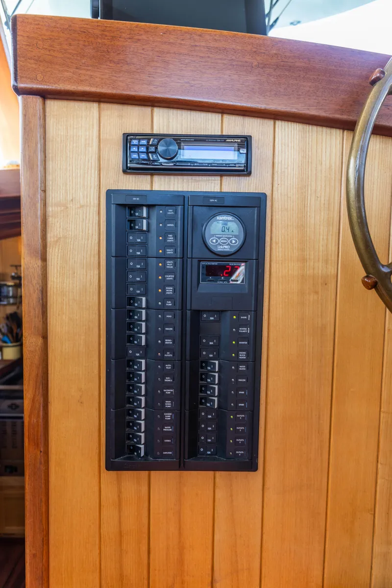 Slide: The Image of Electrical panel and stereo system on a 2009 Custom Gartside Downeast Cruiser. - 20