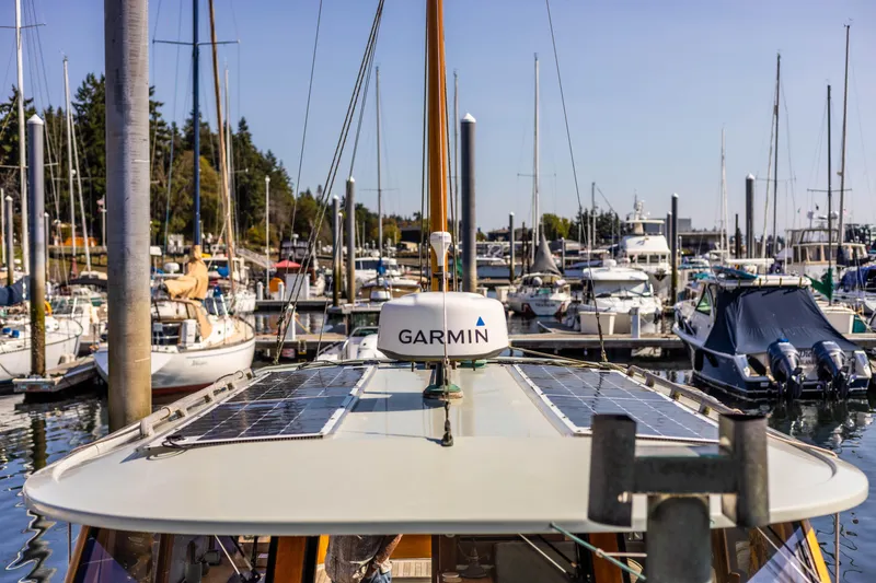 Slide: The Image of Custom 2009 Gartside Downeast Cruiser docked at a marina with Garmin equipment. - 35