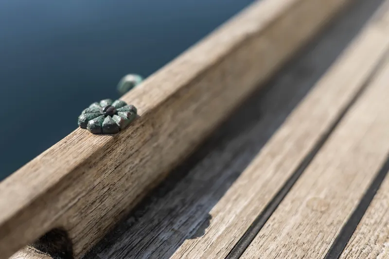 Slide: The Image of Close-up of wooden deck on 2009 Custom Gartside Downeast Cruiser. - 36