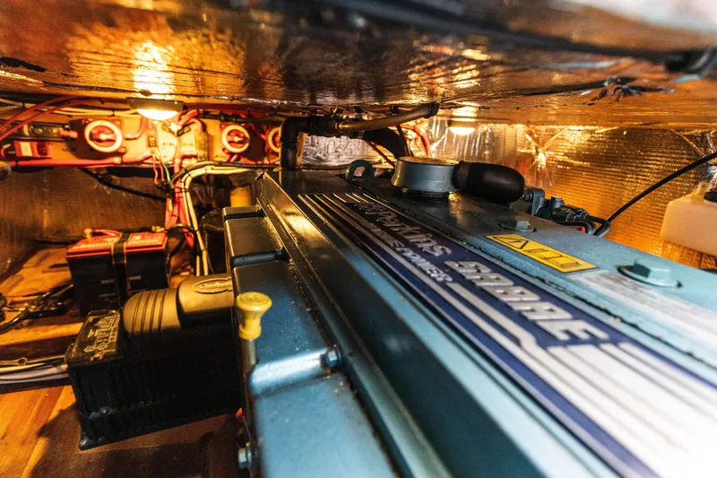 Slide: The Image of Engine room of a 2009 Custom Gartside Downeast Cruiser with detailed wiring and components. - 39