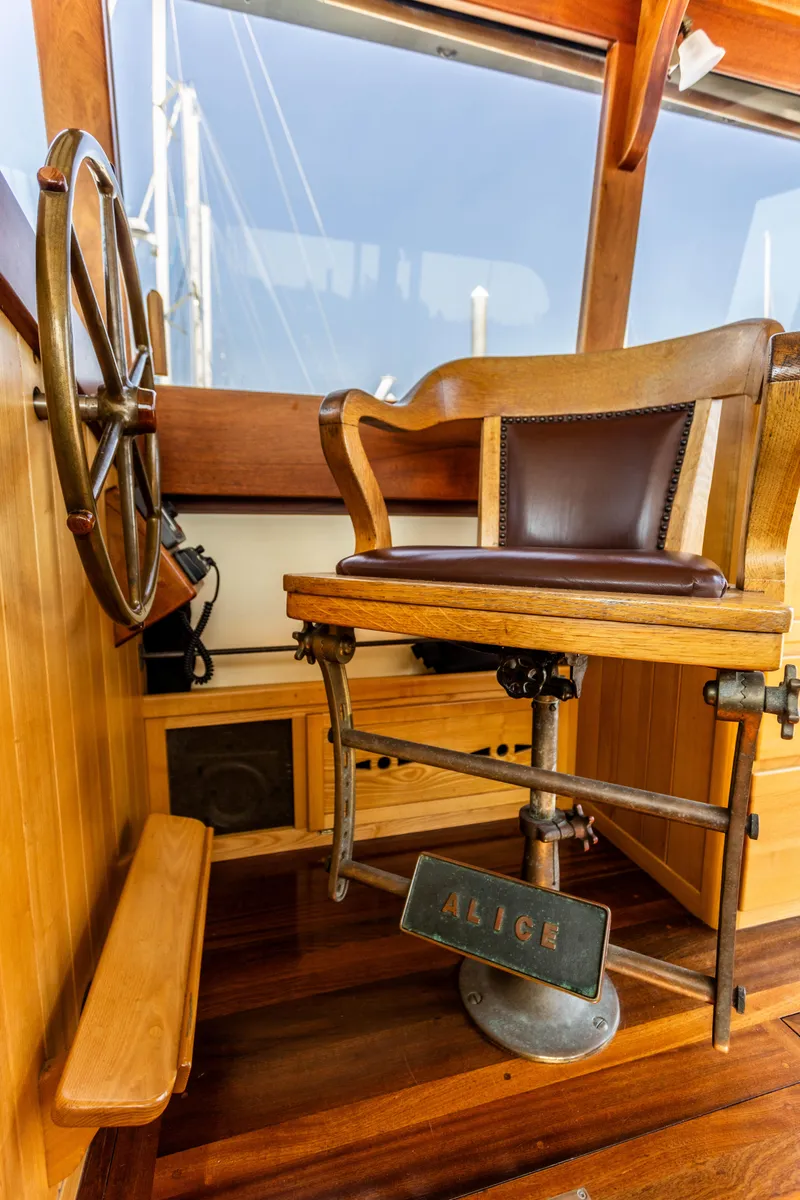 Slide: The Image of 2009 Custom Gartside Downeast Cruiser helm station with wooden captain's chair. - 40