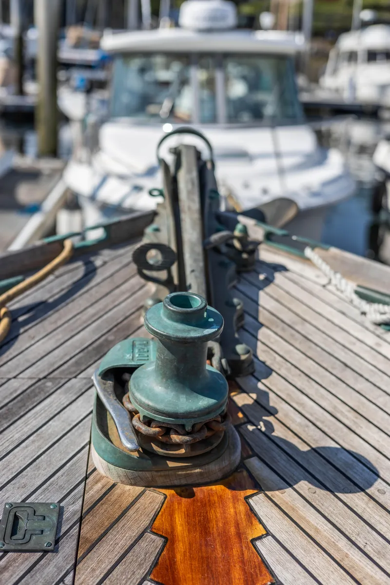 Slide: The Image of Bow of 2009 Custom Gartside Downeast Cruiser with anchor winch and wooden deck. - 46