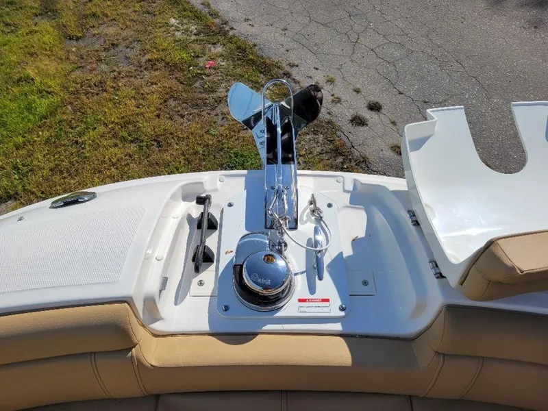 Slide: The Image of 2024 Sea Ray SDX 270 boat anchor system and seating area. - 19