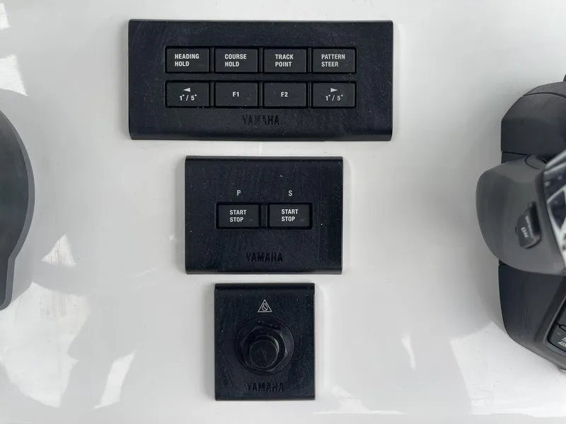 Slide: The Image of Control panel of 2024 Sea Hunt Gamefish 27 FS boat with Yamaha buttons. - 10