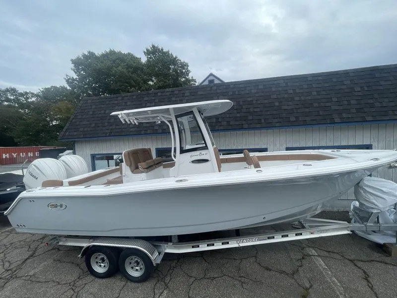 Slide: The Image of 2024 Sea Hunt Gamefish 27 FS boat on trailer, side view. - 15