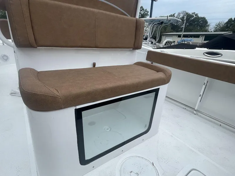 Slide: The Image of 2024 Sea Hunt Gamefish 27 FS boat seating and storage compartment. - 6