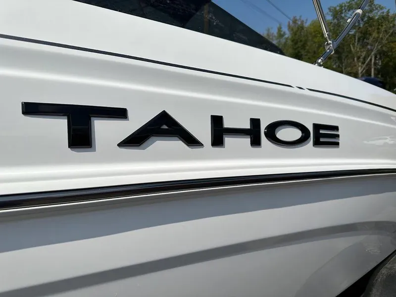 Slide: The Image of 2024 Tahoe T21 boat side view with logo. - 3