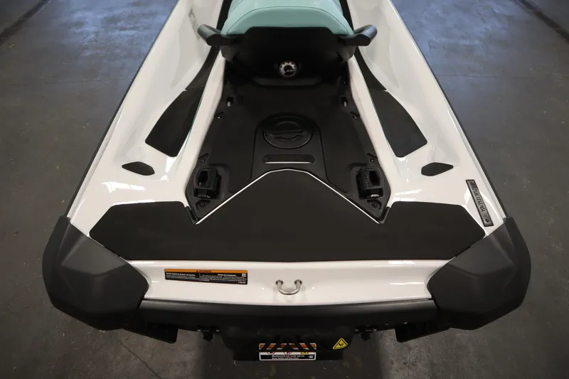 Slide: The Image of 2025 Sea-Doo GTI™ 130 rear view, showcasing sleek design and seating. - 12