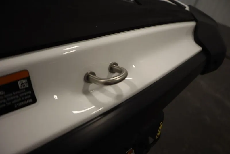 Slide: The Image of 2025 Sea-Doo GTI 130 close-up of rear handle and hull design. - 23