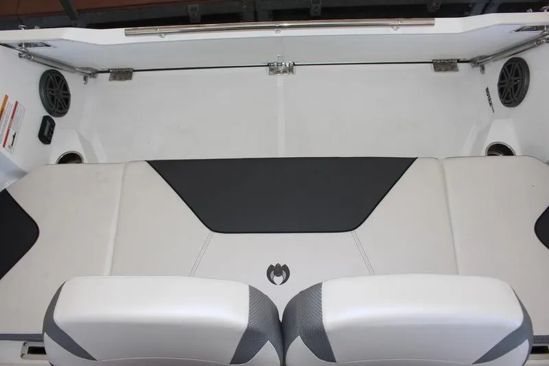 Slide: The Image of 2023 Scarab 255 ID boat interior seating with black and white upholstery. - 11